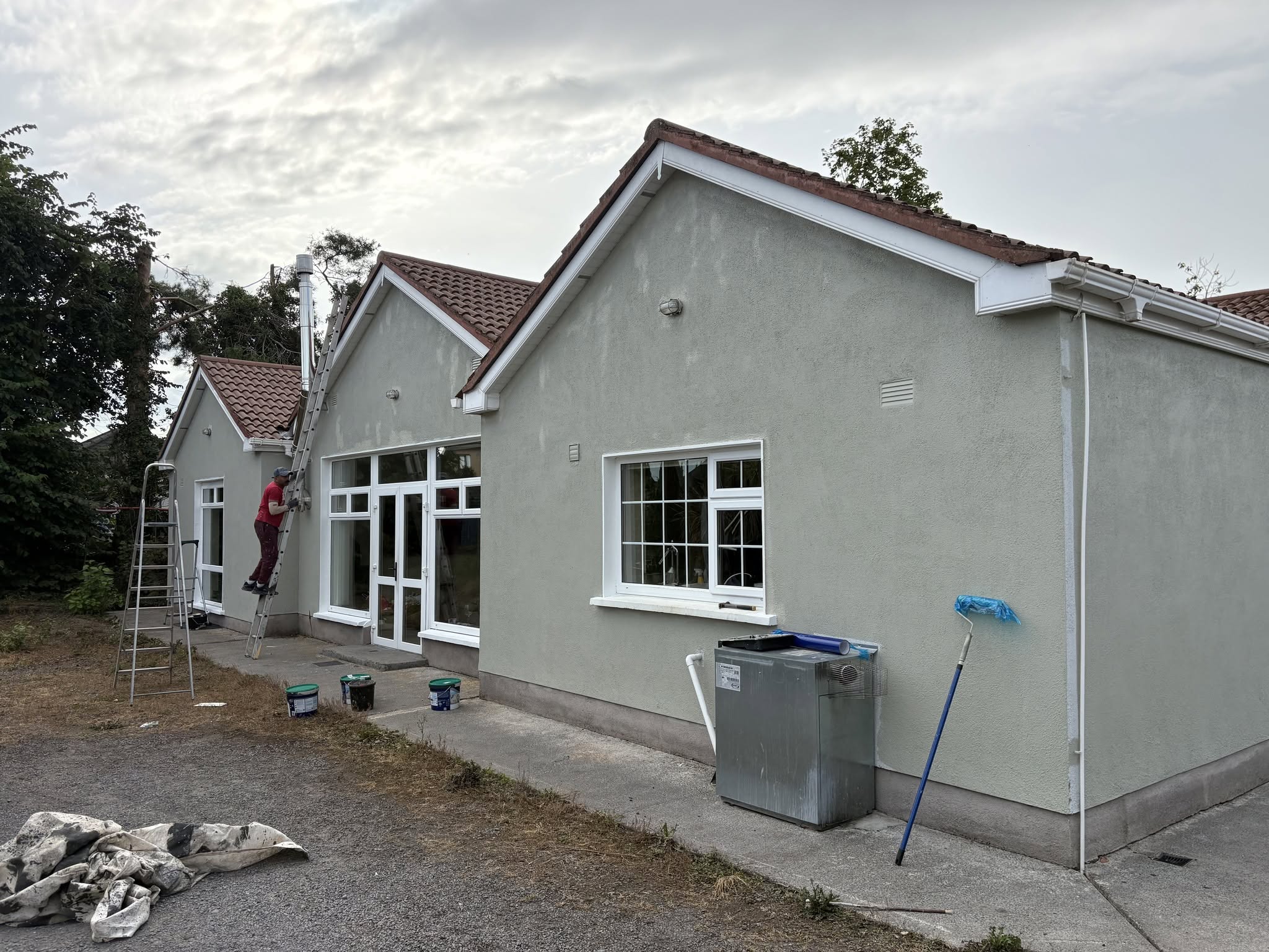 Kilkenny County Painters working on a house exterior